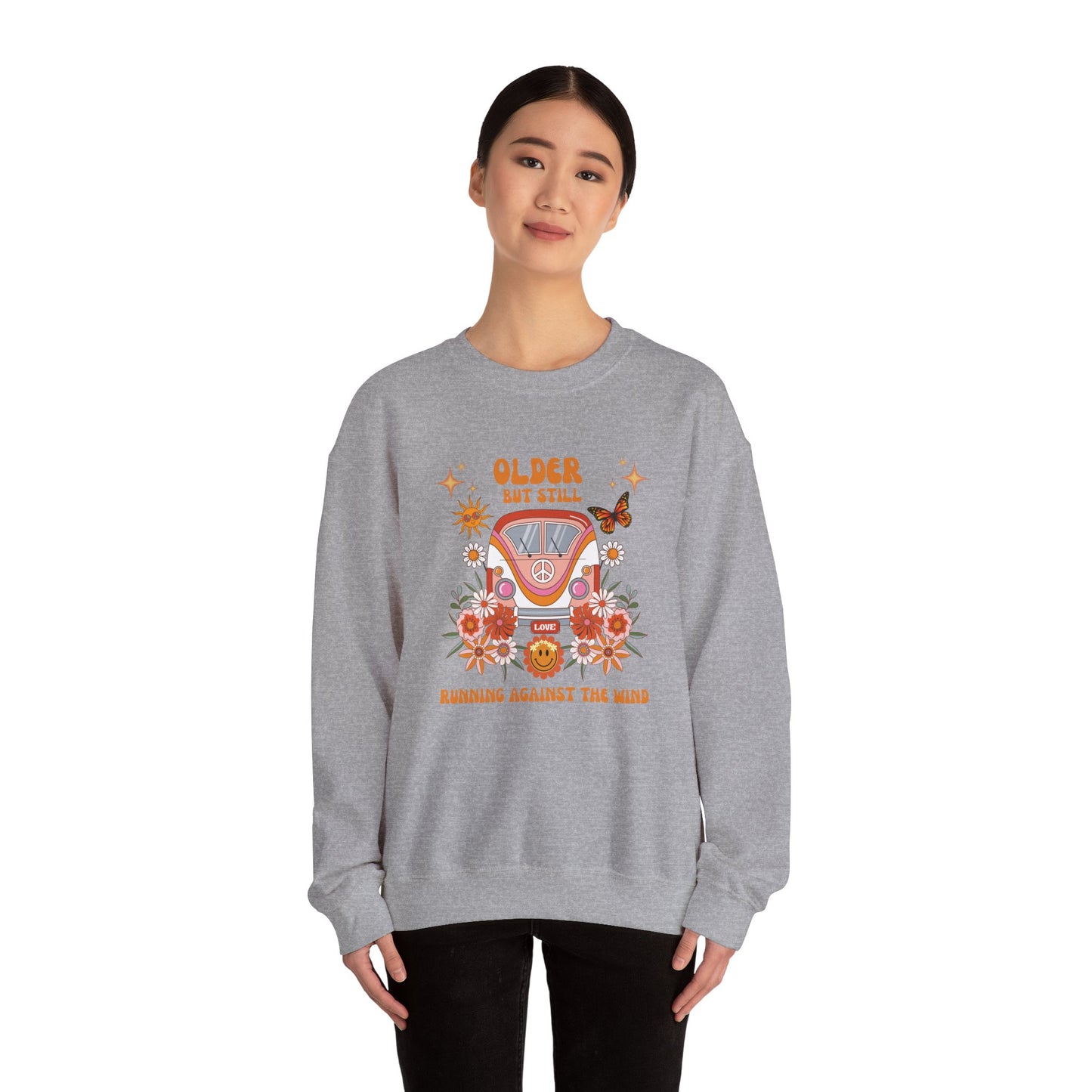 Older But Still Running Against The Wind Unisex Heavy Blend™ Crewneck Sweatshirt
