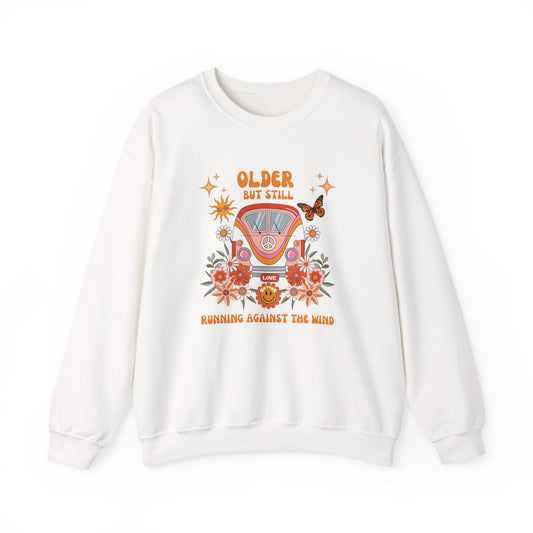 Older But Still Running Against The Wind Unisex Heavy Blend™ Crewneck Sweatshirt