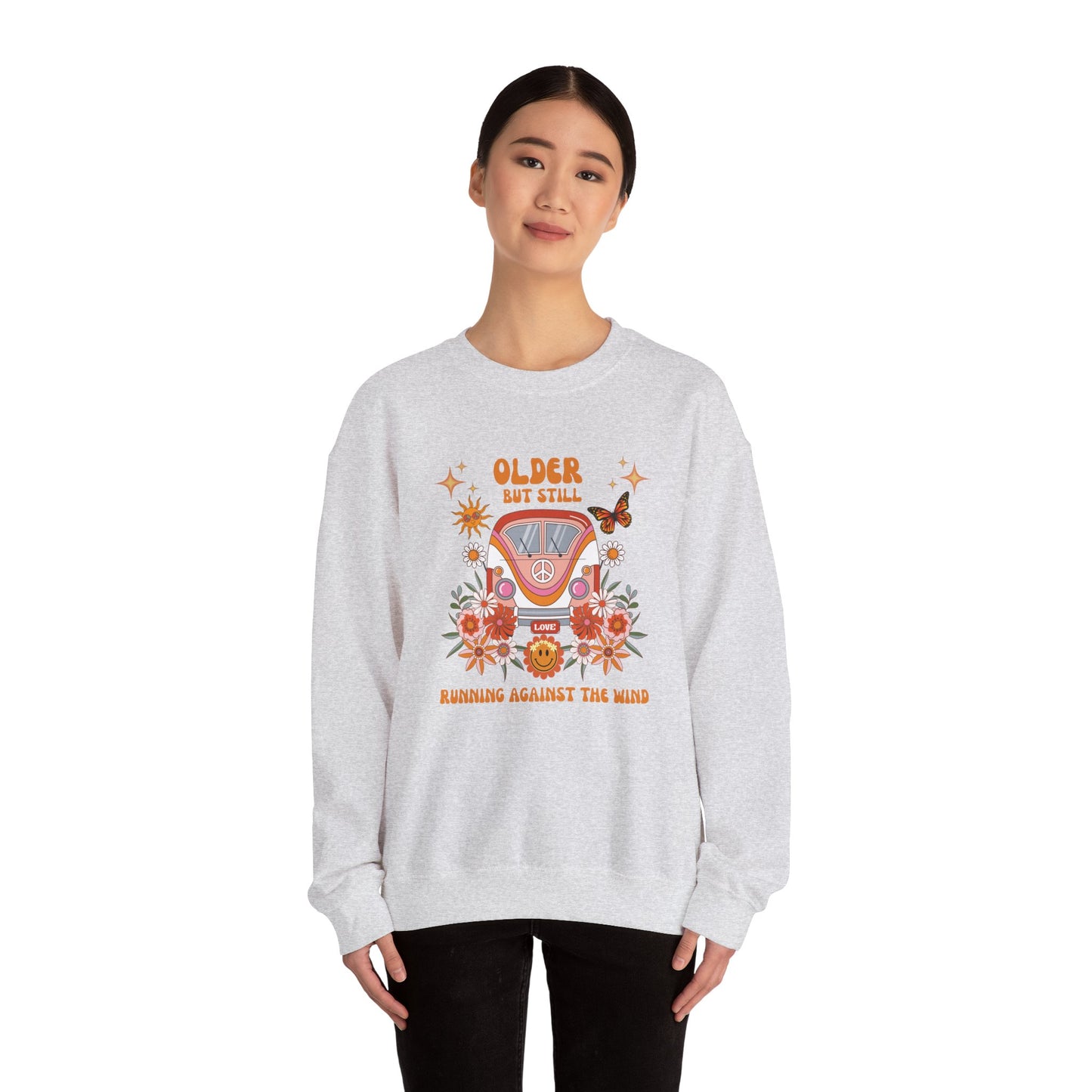 Older But Still Running Against The Wind Unisex Heavy Blend™ Crewneck Sweatshirt